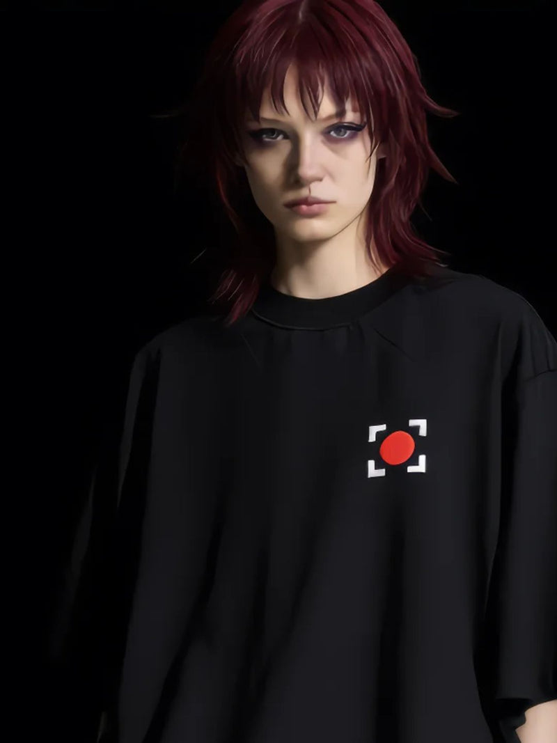 Official archive portrait of Nya standing against the Null-Signal Void. She is calibrated in the boxy, oversized black 280 GSM cotton Core Shell (Artifact 04) with high-density red circle and white bracket embroidery. Her shaggy Maroon Red wolf-cut and glitch purple eyeshadow serve as the primary visual frequency. The silhouette is defined by high-contrast side-lighting, emphasizing the heavy-fabric drape and technical stacking of the Signal Bottoms.