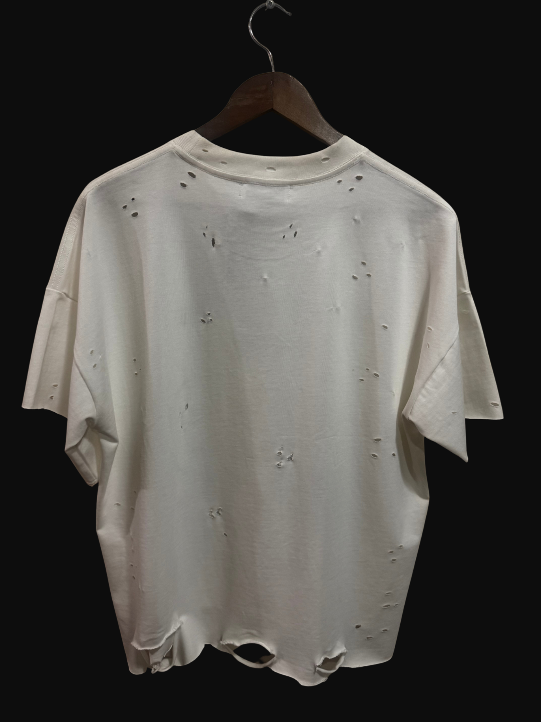 OBAY DI DREAM Artifact 018.5 Refuse The Script outer shell Ghost distressed off-white back view heavyweight cotton hanging on a hanger black background. 